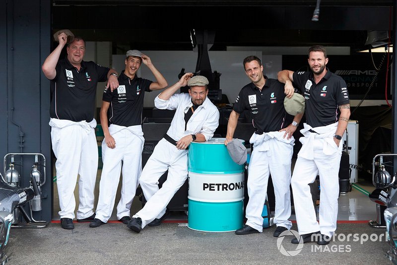 Mercedes AMG F1 team members dressed in 1950's clothing to celebrate Mercedes 125th year in Motorsport