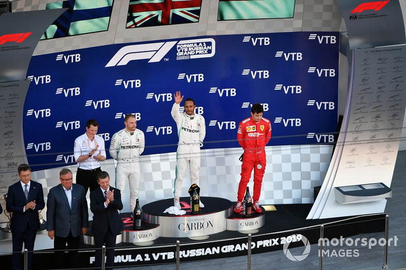Fred Judd, Chief Engineer Trackside, Mercedes AMG F1, Valtteri Bottas, Mercedes AMG F1, 2nd position, Lewis Hamilton, Mercedes AMG F1, 1st position, and Charles Leclerc, Ferrari, 3rd position, on the podium