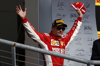 Kimi Raikkonen, Ferrari, 1st position, arrives on the podium