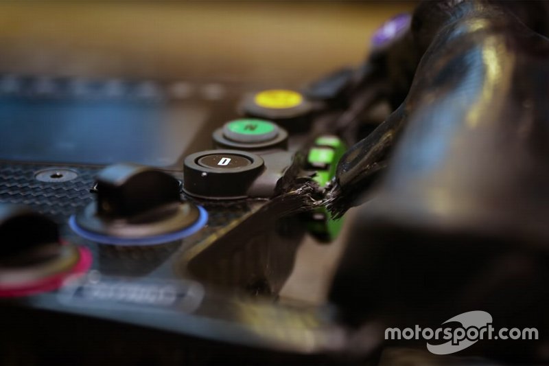 Fernando Alonso's broken steering wheel