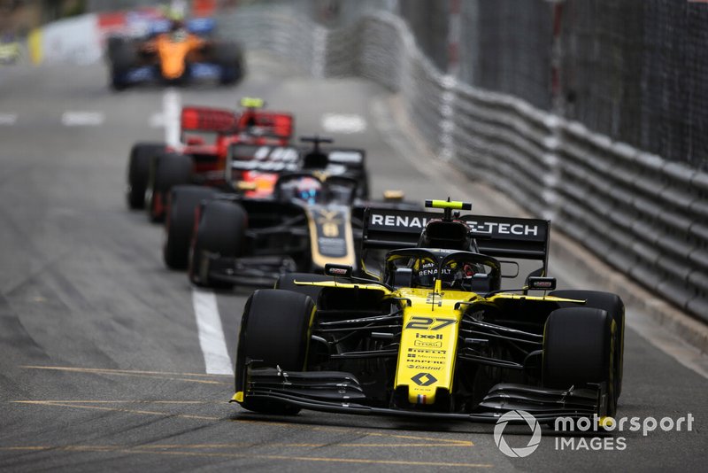 Nico Hulkenberg, Renault R.S. 19, leads Romain Grosjean, Haas F1 Team VF-19