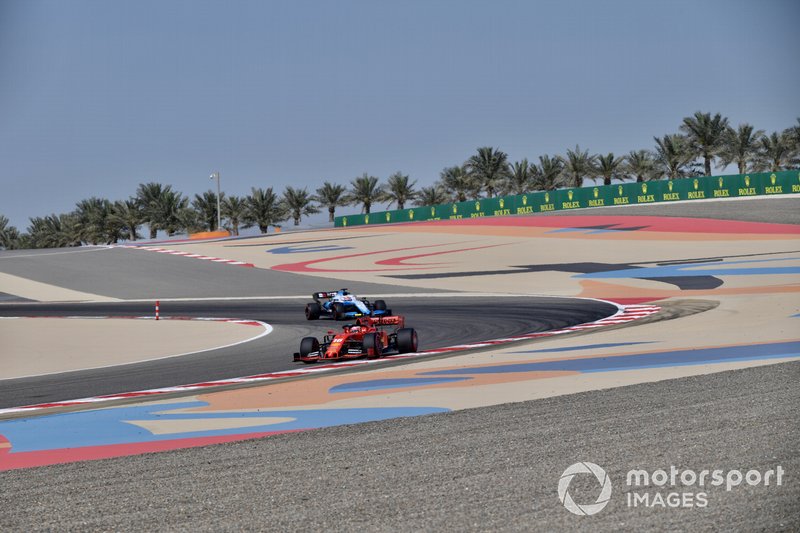 Charles Leclerc, Ferrari SF90, leads George Russell, Williams Racing FW42