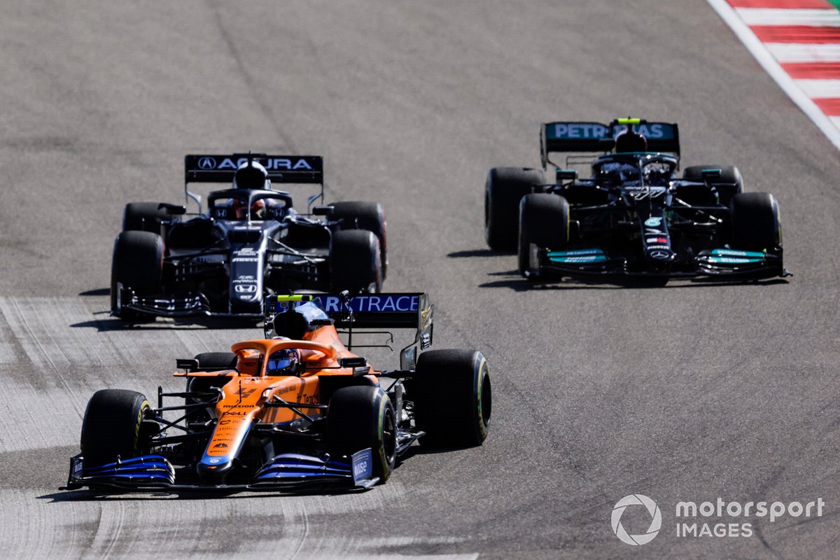 Lando Norris, McLaren MCL35M, Yuki Tsunoda, AlphaTauri AT02, and Valtteri Bottas, Mercedes W12