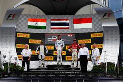 Alexander Albon, ART Grand Prix; Arjun Maini, Jenzer Motorsport and Charles Leclerc, ART Grand Prix stand on the podium