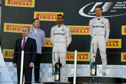 Podium: Vladimir Putin, Russian Federation President, winner Nico Rosberg, Mercedes AMG F1 Team, second place Lewis Hamilton, Mercedes AMG F1 Team