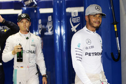 Lewis Hamilton, Mercedes AMG F1 and team mate Nico Rosberg, Mercedes AMG F1 in qualifying parc ferme