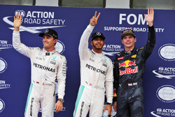 Qualifying top three in parc ferme: Nico Rosberg, Mercedes AMG F1, second; Lewis Hamilton, Mercedes