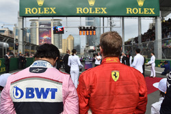 Sergio Perez, Force India and Kimi Raikkonen, Ferrari on the grid