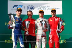 Nyck De Vries, PREMA Racing celebrates on the podium after winning the race with Lando Norris, Carlin, and Antonio Fuoco, Charouz Racing System