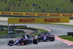 Carlos Sainz Jr., Scuderia Toro Rosso STR12 and Pierre Gasly, Scuderia Toro Rosso STR12