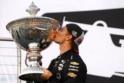 2017 champion Josef Newgarden, Team Penske Chevrolet celebrates by kissing the Astor Cup on the podium