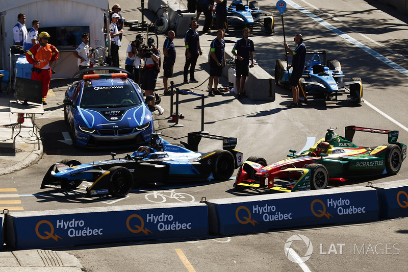 Sébastien Buemi, Renault e.Dams, and Daniel Abt, ABT Schaeffler Audi Sport, leave the pits