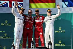 Podium: winner Sebastian Vettel, Ferrari, second place Lewis Hamilton, Mercedes AMG F1, third place 