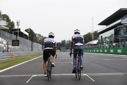 Esteban Ocon, Force India, Sergio Perez, Force India, take to the circuit on bicycles