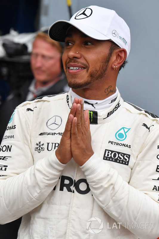 Pole sitter Lewis Hamilton, Mercedes AMG F1 celebrates in parc ferme