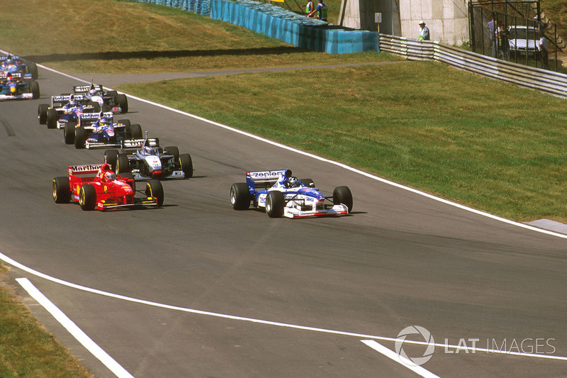 Damon Hill, Arrows A18 Yamaha, Eddie Irvine, Ferrari F310B and Mika Hakkinen McLaren MP4/12 Mercedes