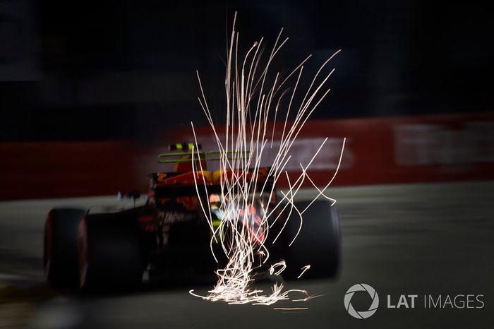 Max Verstappen, Red Bull Racing RB13, kicks up some sparks