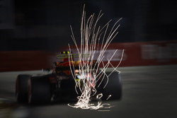 Max Verstappen, Red Bull Racing RB13, kicks up some sparks