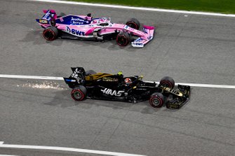 Sergio Perez, Racing Point RP19, et Kevin Magnussen, Haas F1 Team VF-19