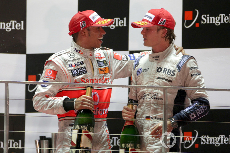 Lewis Hamilton, McLaren and Nico Rosberg, Williams celebrate on the podium