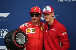 Mick Shcumacher presents the Pirelli Pole Position Award to Kimi Raikkonen, Ferrari 