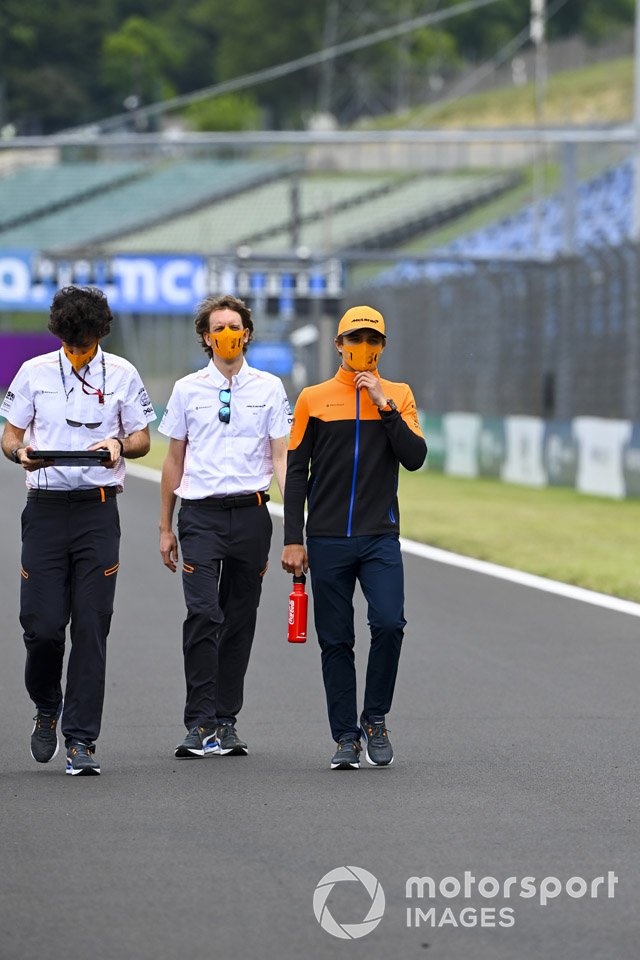 Lando Norris, McLaren walks the track