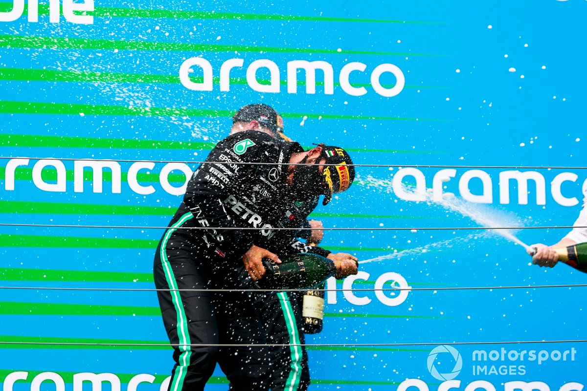 Lewis Hamilton, Mercedes-AMG Petronas F1, 1st position, Valtteri Bottas, Mercedes-AMG Petronas F1, 3rd position, and Peter Bonnington, Race Engineer, Mercedes AMG, on the podium