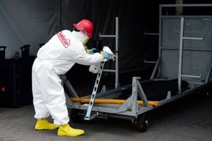 A worker cleans areas