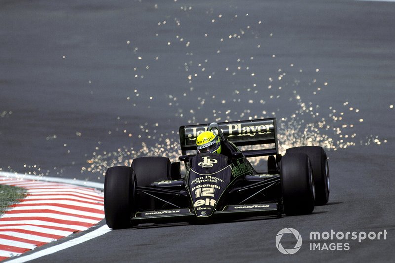 Ayrton Senna, Lotus 98T sends the sparks flying as he climbs Eau Rouge