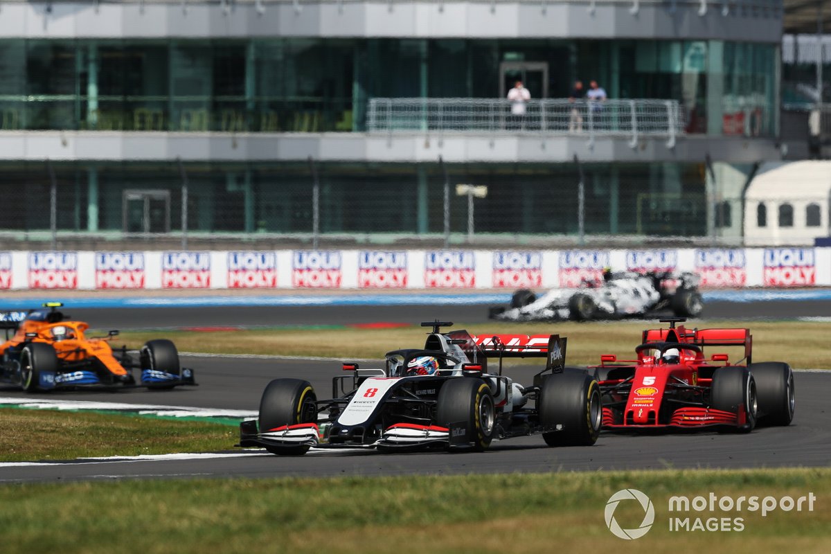 Romain Grosjean, Haas VF-20, Sebastian Vettel, Ferrari SF1000, and Lando Norris, McLaren MCL35