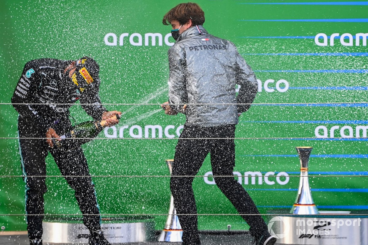 Lewis Hamilton, Mercedes-AMG F1, 1st position, and Steven Lord, Mercedes, ceebrate on the podium