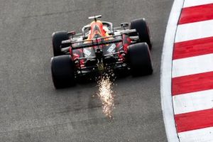 Sparks fly from the car of Max Verstappen, Red Bull Racing RB16