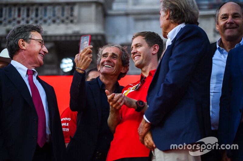 Alain Prost takes a selfie with Sebastian Vettel, Ferrari