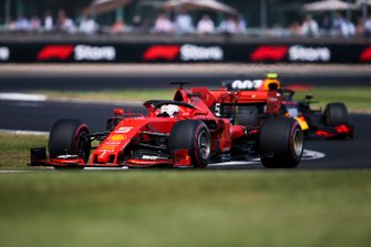 Sebastian Vettel, Ferrari SF90, leads Pierre Gasly, Red Bull Racing RB15