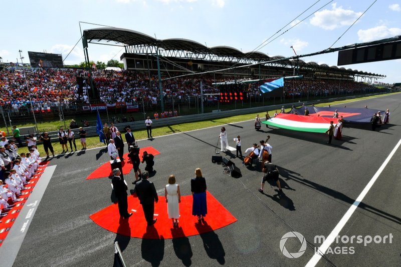 The Hungarian national anthem is played as part of the pre race grid celebrations