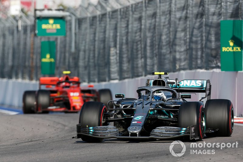 Valtteri Bottas, Mercedes AMG W10, leads Charles Leclerc, Ferrari SF90