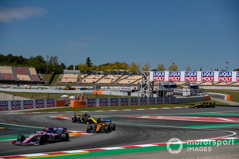 Lance Stroll, Racing Point RP19, leads Lando Norris, McLaren MCL34, and Daniel Ricciardo, Renault R.S.19