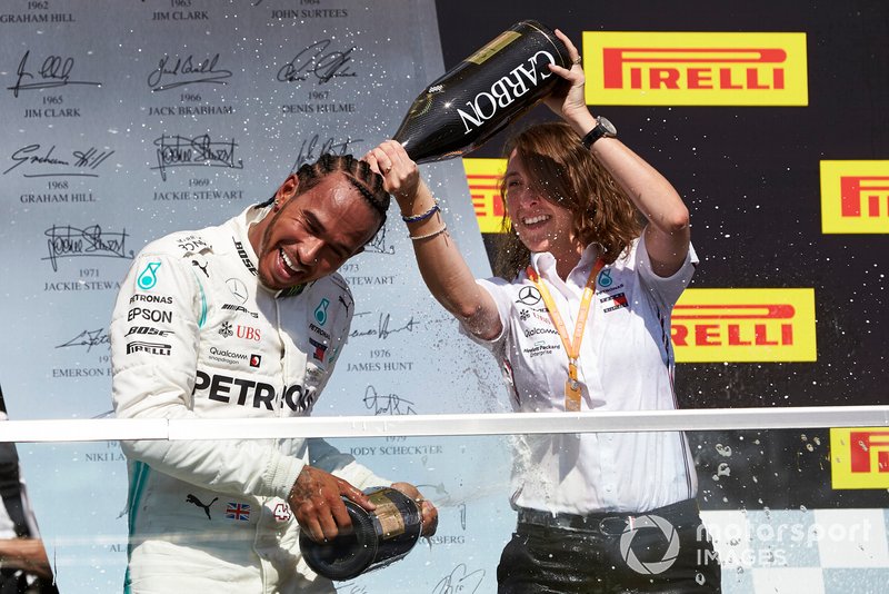 Lewis Hamilton, Mercedes AMG F1, 1st position, celebrates with his team mate on the podium