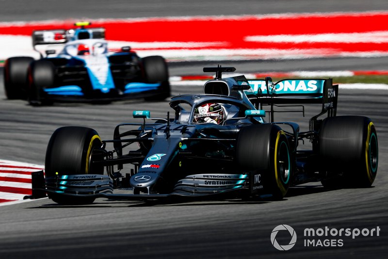 Lewis Hamilton, Mercedes AMG F1 W10, leads Robert Kubica, Williams FW42
