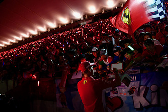 Sebastian Vettel, Ferrari signs autographs for the fans