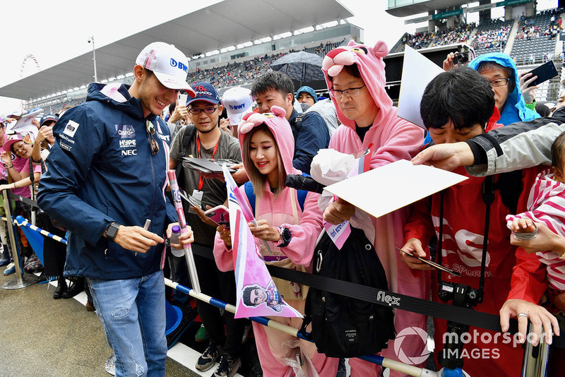 Esteban Ocon, Racing Point Force India F1 Team signs autographs for fans