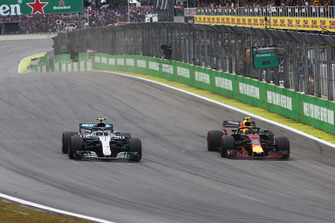 Max Verstappen, Red Bull Racing RB14, overtakes Max Verstappen, Red Bull Racing RB14.