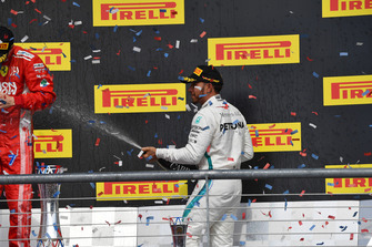 Lewis Hamilton, Mercedes AMG F1 celebrates on the podium with the champagne