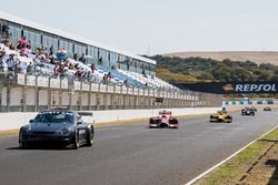 The Safety Car leads the field