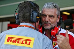Maurizio Arrivabene, Ferrari Team Principal with Mario Isola, Pirelli Racing Manager