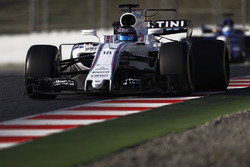 Lance Stroll, Williams FW40, leads Marcus Ericsson, Sauber C36