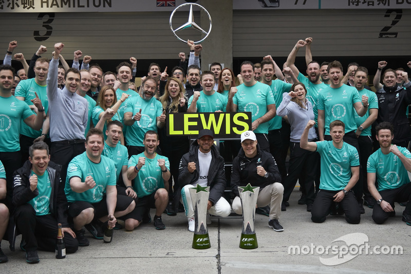 Race winner Lewis Hamilton, Mercedes AMG, and Valtteri Bottas, Mercedes AMG, celebrate with the Mercedes AMG team