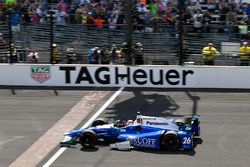 Takuma Sato, Andretti Autosport Honda crosses the finish line and the yard of bricks under the checkered flag for the win