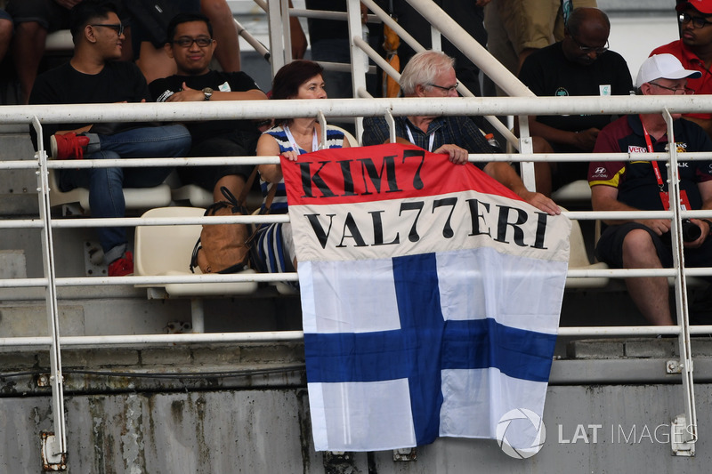 Kimi Raikkonen, Ferrari fans and banner