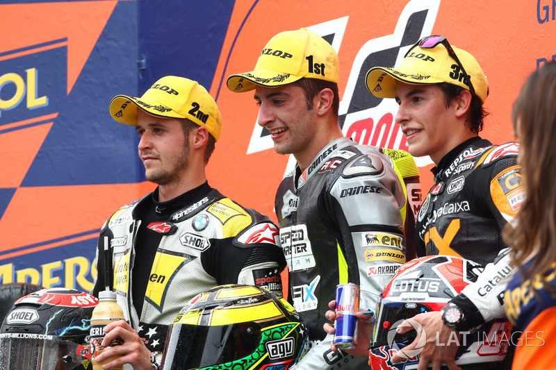 Podium : deuxième place pour Thomas Luthi, victoire pour Andrea Iannone, troisième place pour Marc Marquez